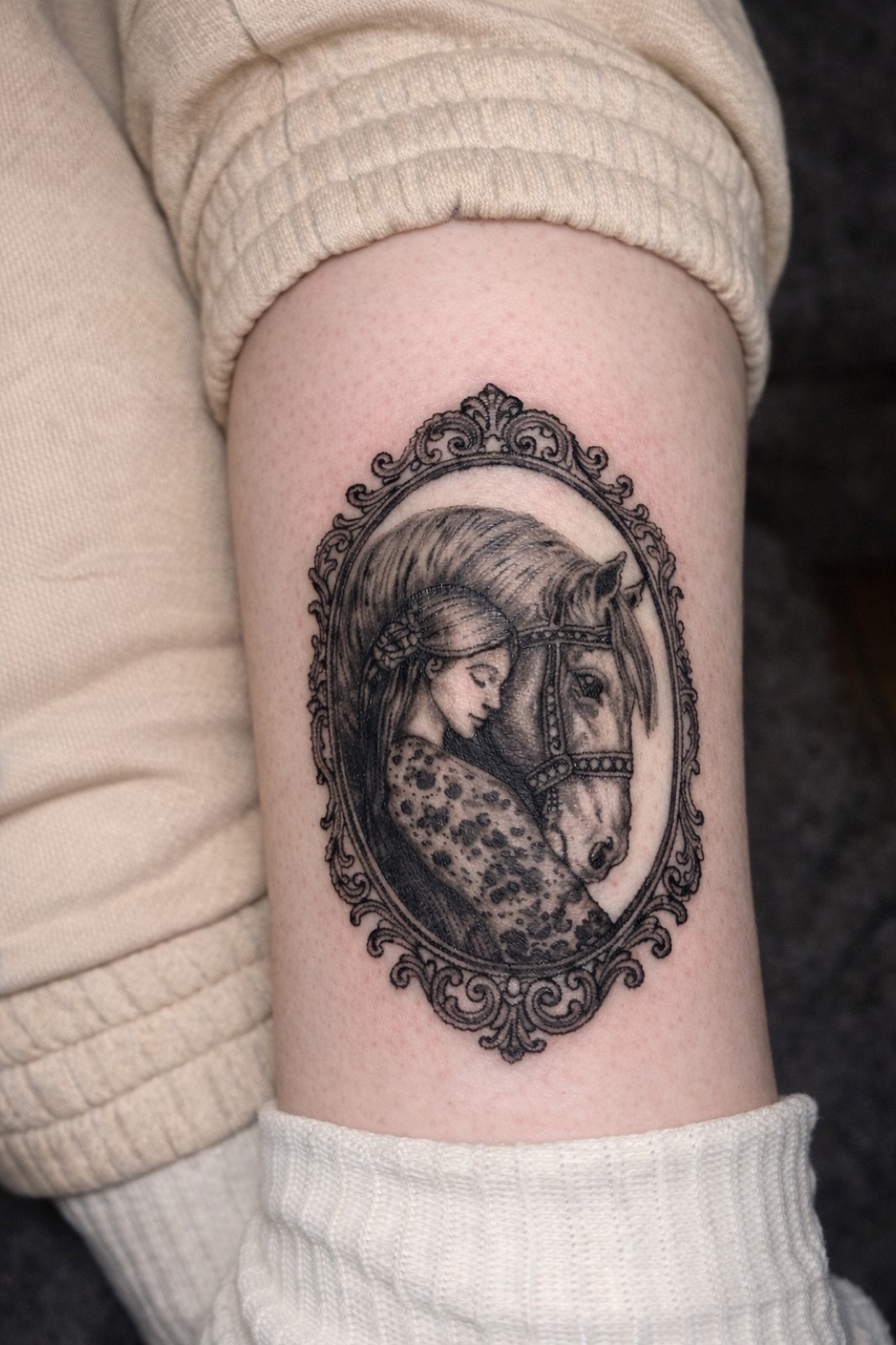 Black and grey realism tattoo on shoulder